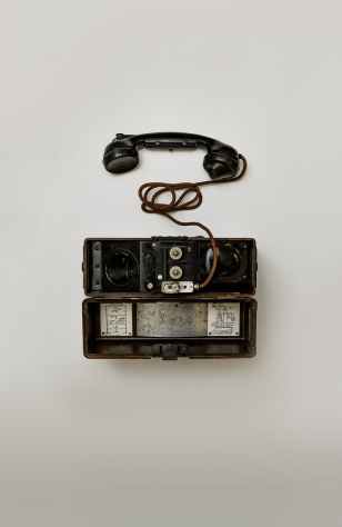 black telephone on white surface